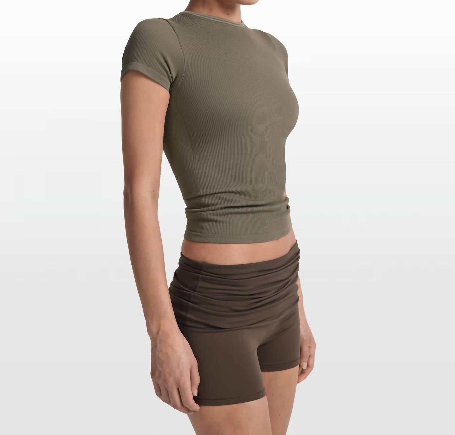 NikeSKIMS Ribbed Seamless Short Sleeve Top in oak moss dune - women's t-shirt - detail view