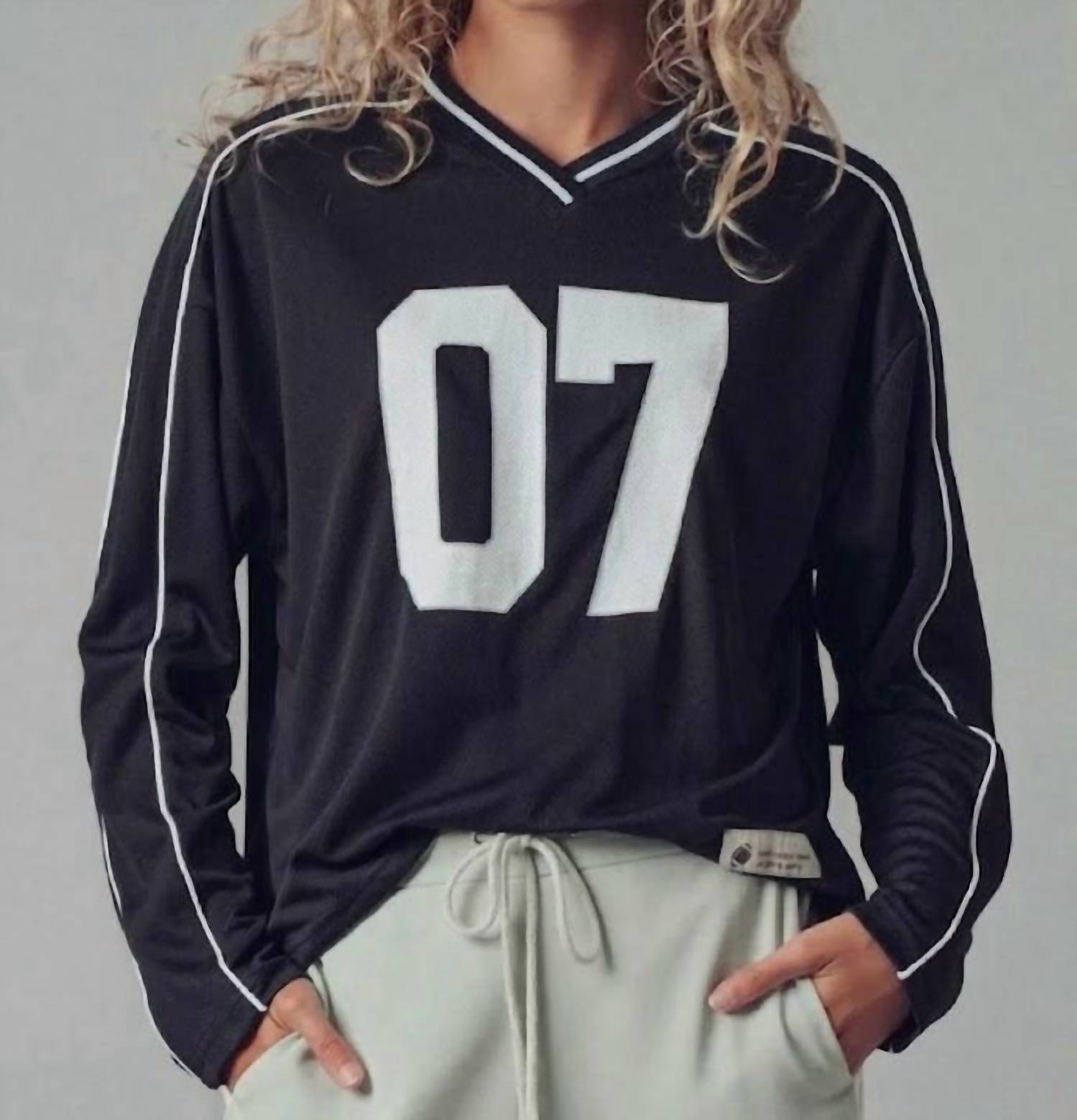 Urban Daizy Varsity 07 Graphic V-neck Jersey Top in black - women's long sleeve top