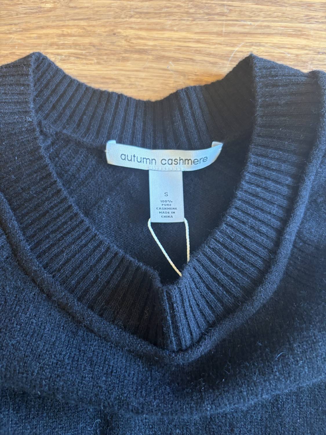 Autumn Cashmere Women's Relaxed Fit Raglan Sweater in black - women's sweater - detail view