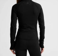 BEYOND YOGA pacer fleece quarter zip pullover in black - women's top - detail view