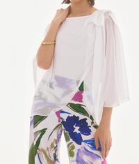 Joseph Ribkoff Chiffon Silky Knit Poncho Top With Bow in white - women's sweater