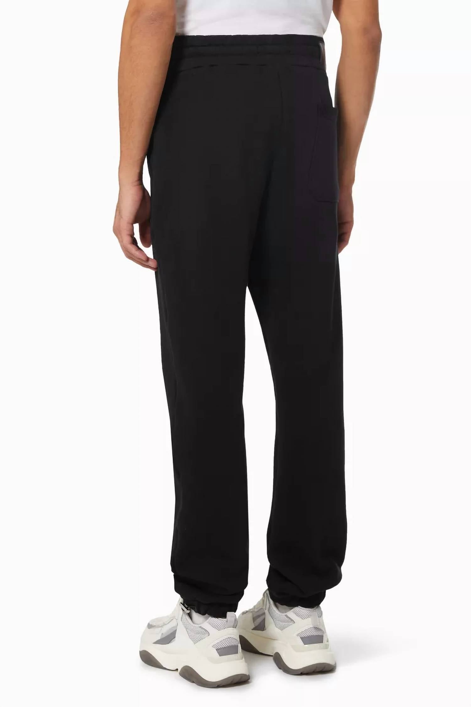 Amiri Leopard Applique Sweatpants in black - men's pants - alternate view