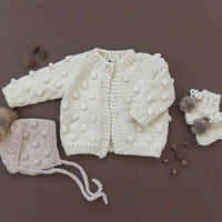 The Blueberry Hill Kid's Popcorn Knit Cardigan Sweater in cream - kids' sweater - alternate view