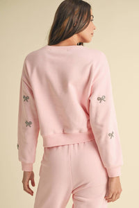 ENDLESS BLU. Jewel Bow Cotton Pullover Sweater in baby pink - women's sweater - detail view