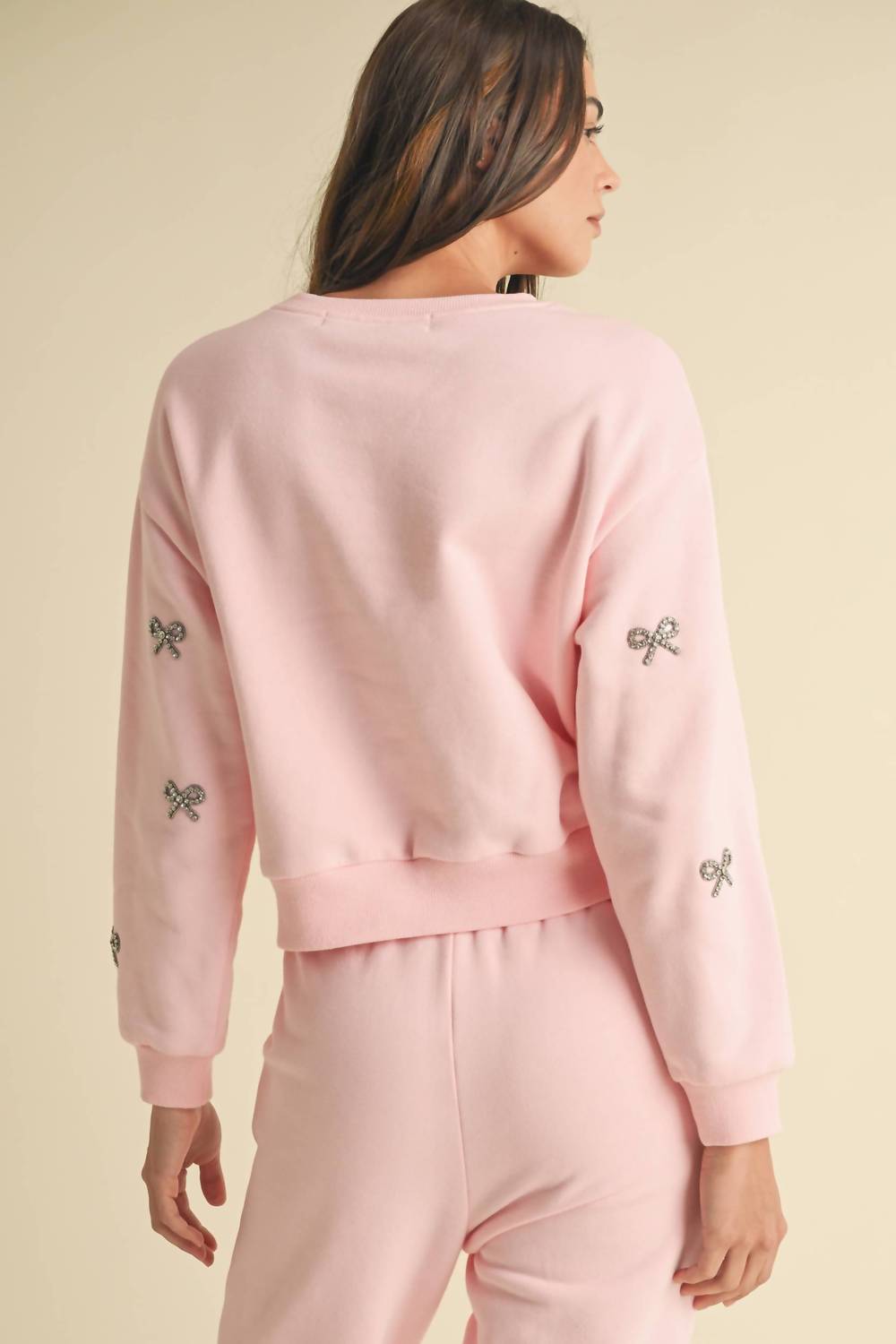 ENDLESS BLU. Jewel Bow Cotton Pullover Sweater in baby pink - women's sweater - detail view
