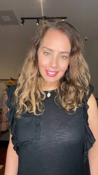 BiBi Slub Knit Ruffle Sleeves With Front Pocket Top in black - women's blouse - detail view