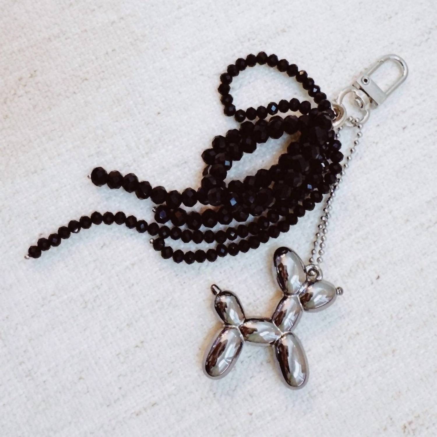 Ellison+Young Women's Balloon Dog Bag Charm And Beaded Bow Keychain in black silver - women's accessory