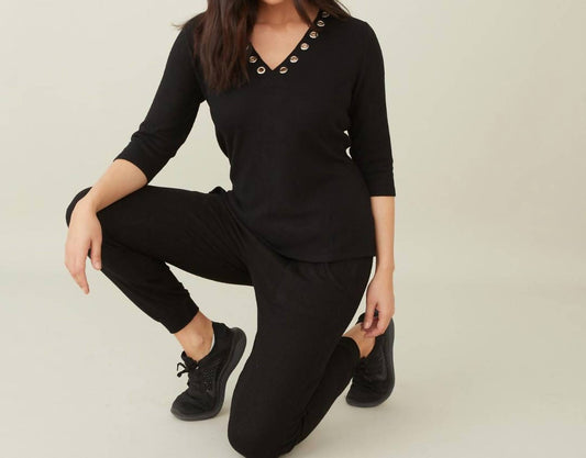 French Kyss - Soft Stretch Grommet V Neck Top