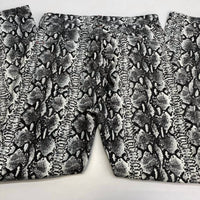 alice + olivia Women’s Snakeskin Skinny Jeans in black white - women's jeans - detail view