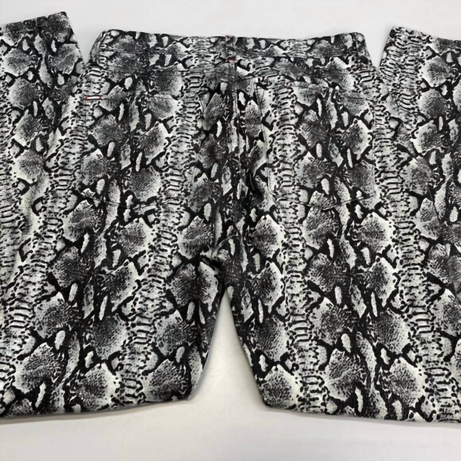alice + olivia Women’s Snakeskin Skinny Jeans in black white - women's jeans - detail view