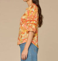 Democracy Blouson Sleeve Mandarin Collar Half Placket Printed Knit Top in deep coral floral multi - women's blouse - detail view