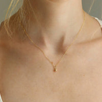 Token Jewelry - Golden Globe Necklace
