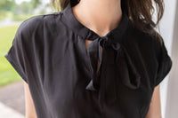 Doe and Rae Midnight Charm Tie Neck Blouse in black - women's blouse - detail view