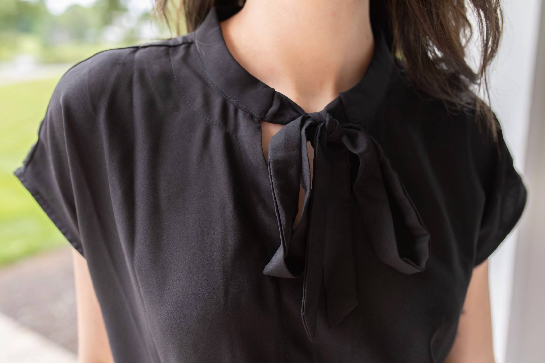 Doe and Rae Midnight Charm Tie Neck Blouse in black - women's blouse - detail view