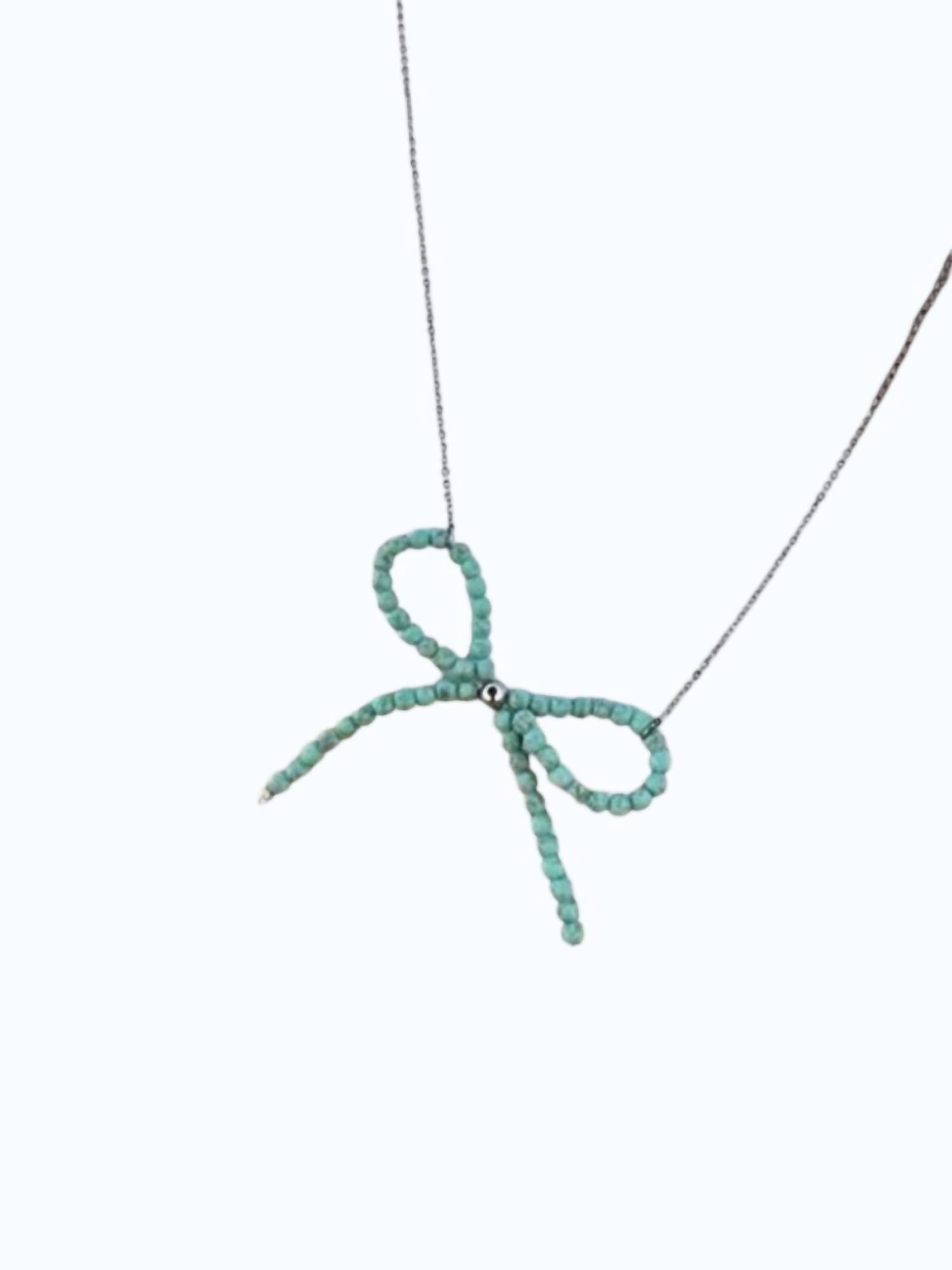 Rowdy Crowd Women's Pearl Bow Beaded Necklace in teal navajo - women's jewelry