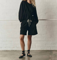 THE GREAT. The Slouchy Corset Sweatshirt in true black - women's top
