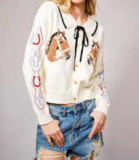 Blue B Horse Face Bow Tie Knit Cardigan in cream - women's cardigan - detail view