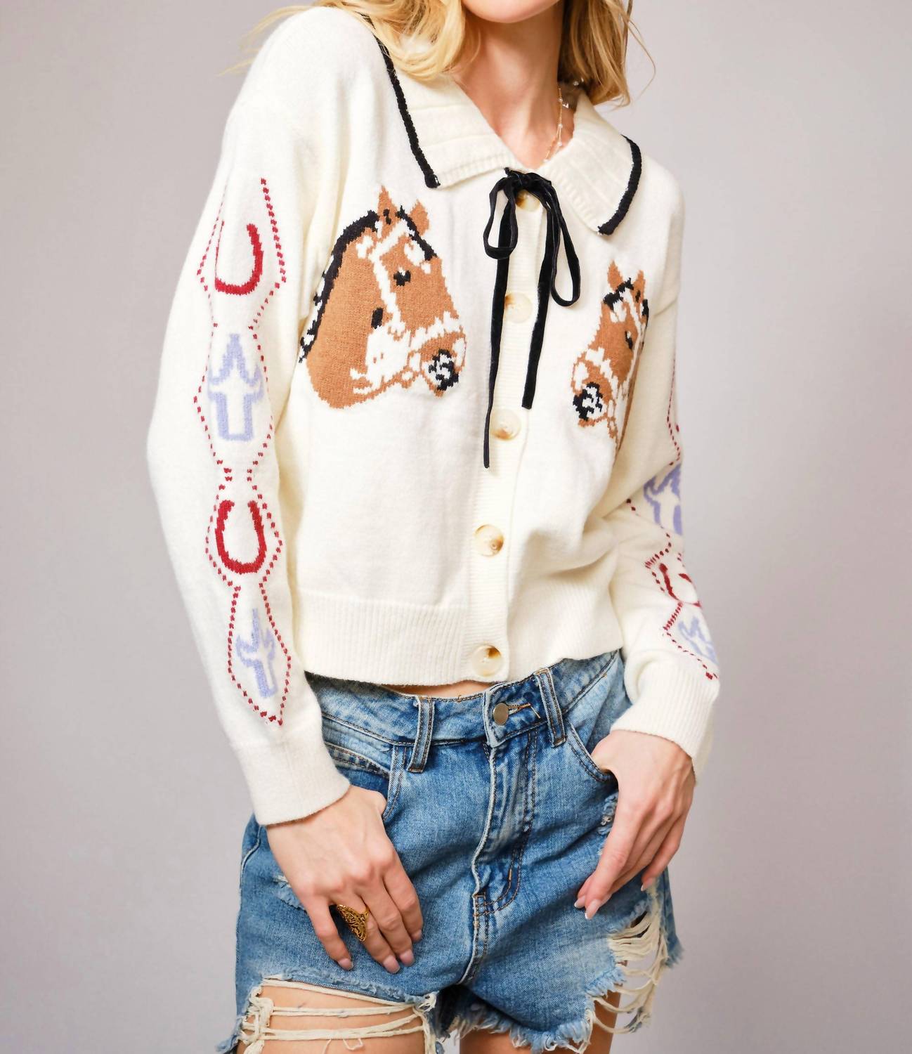 Blue B Horse Face Bow Tie Knit Cardigan in cream - women's cardigan - detail view