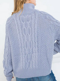 OVERSIZED CABLE-KNIT HALF-ZIP SWEATER