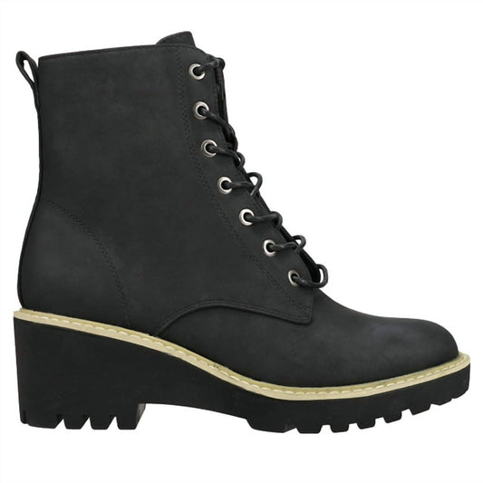 Lace up wedge heel boot