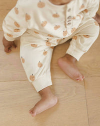 Quincy Mae Kid's Relaxed Fleece Jumpsuit in smiley pumpkins - kids' item - detail view