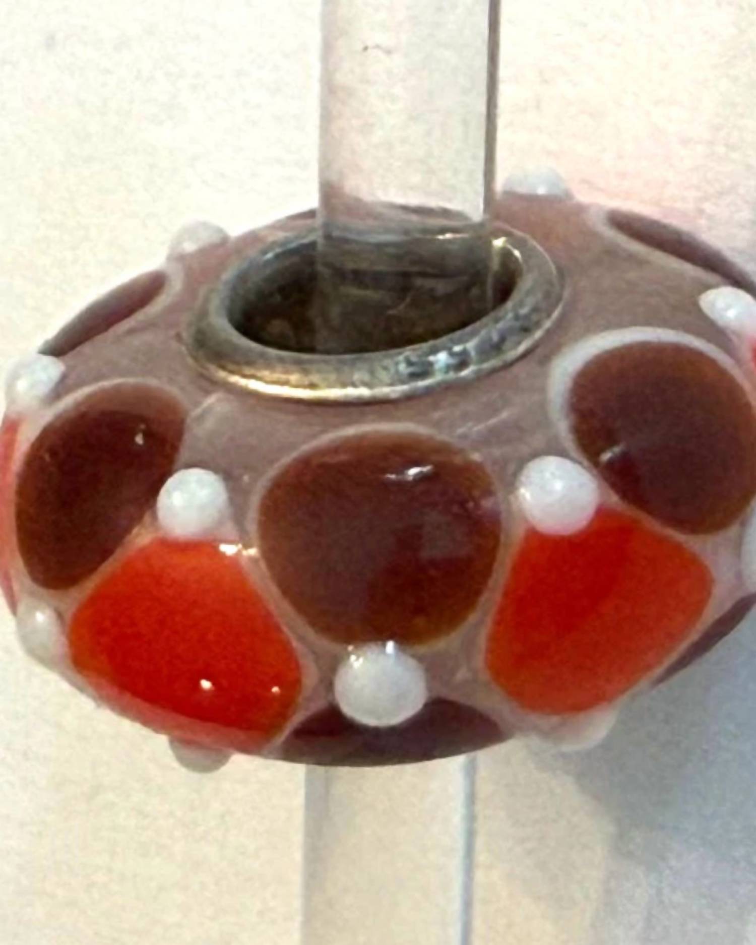 Trollbeads Women's Universal Charm Bead in unique orange brown white dots bead - women's item - detail view