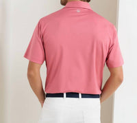 PETER MILLAR Solid Performance Jersey Polo Top in chili red - men's shirt - detail view