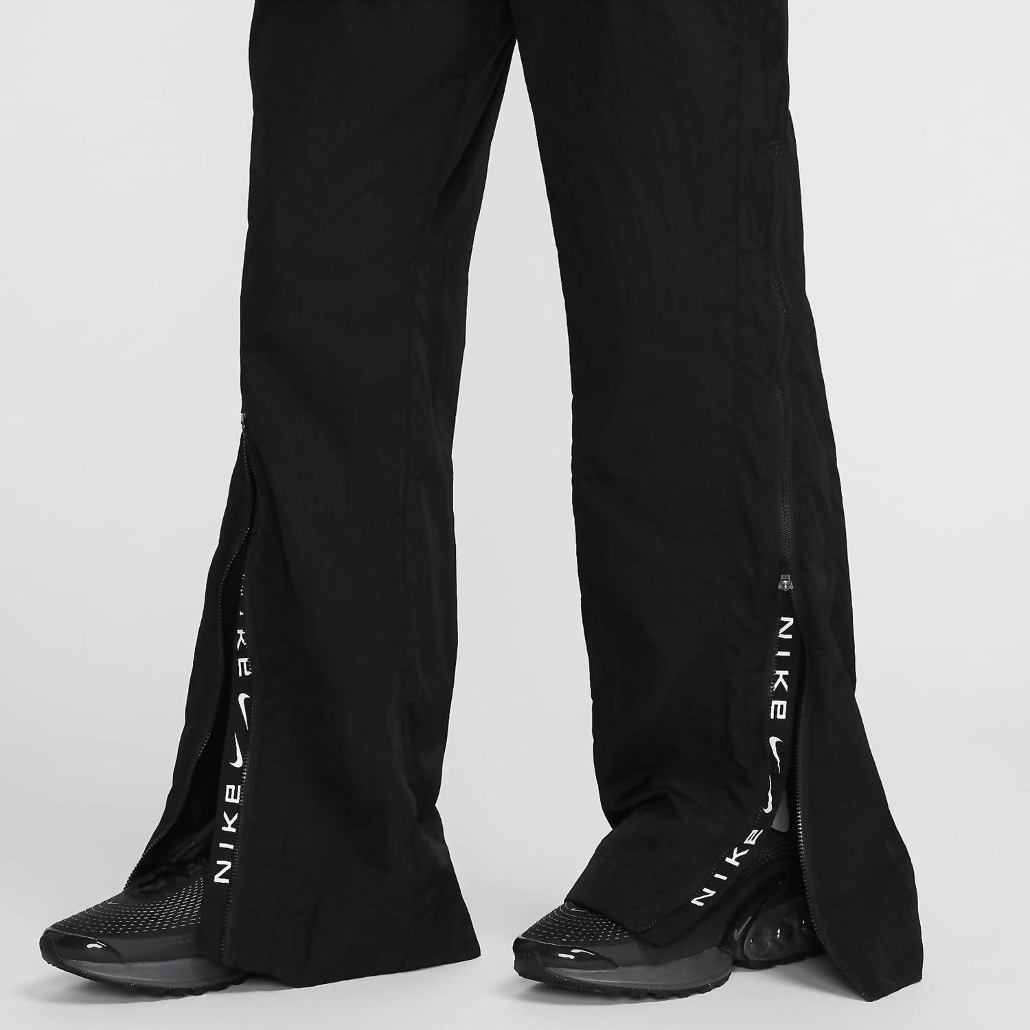 Nike - Women's Mid Rise Repel Zip Pants