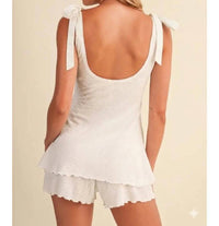 Klesis - Textured Flare Bow Strap Romper