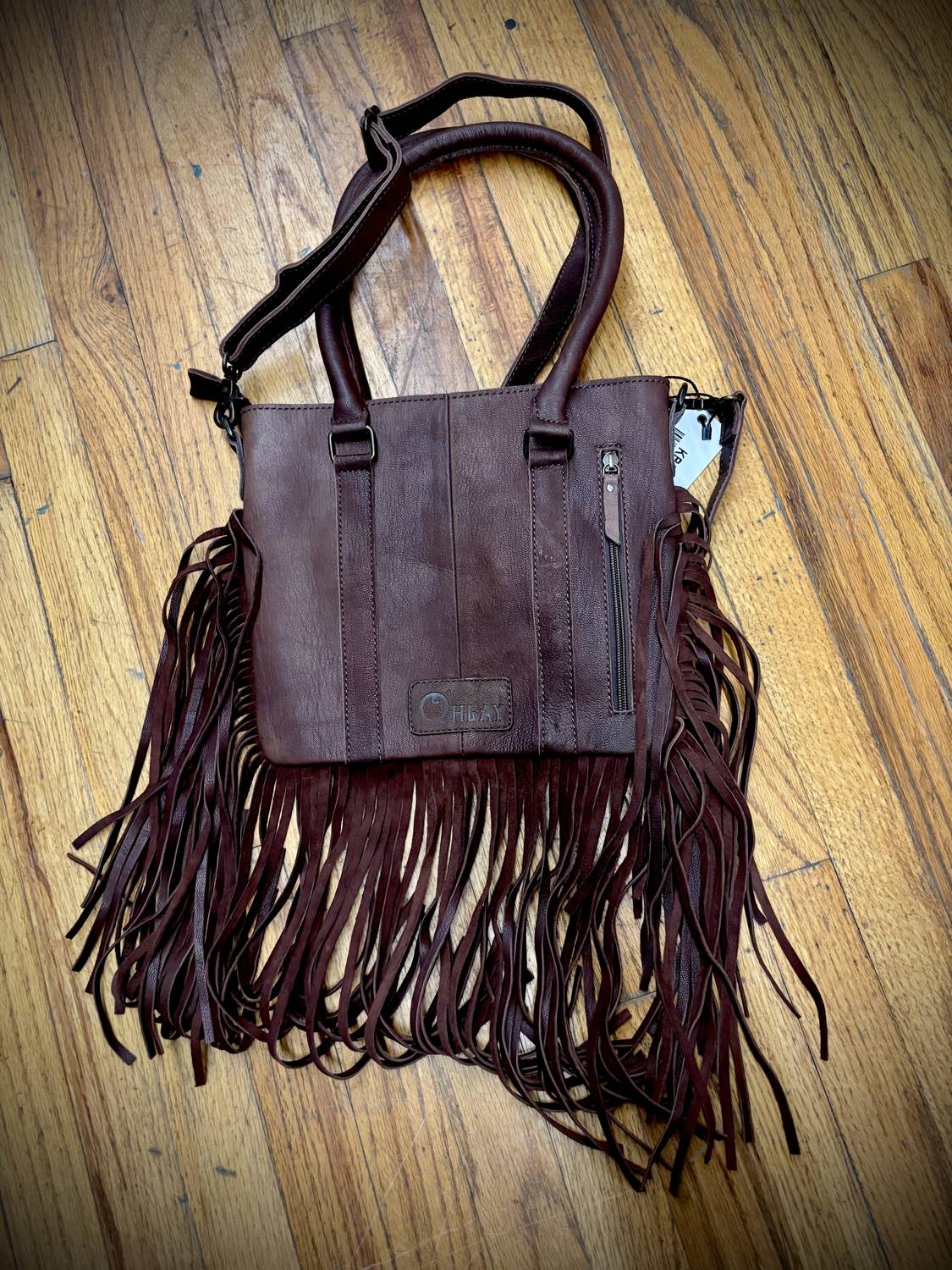 American Darling - O’hlay hair on Hyde hand tooled fringe purse