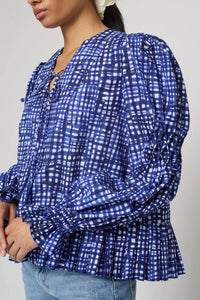 Atelier Delphine Matilda Hand-pleated Peplum Blouse in blue check - women's blouse - detail view
