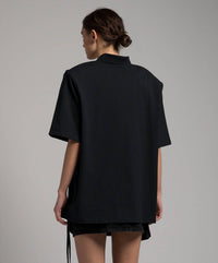 THE ATTICO Pre-loved Polo Shirt With Front Zip With Logo And Shoulder Pads in black - women's t-shirt - detail view