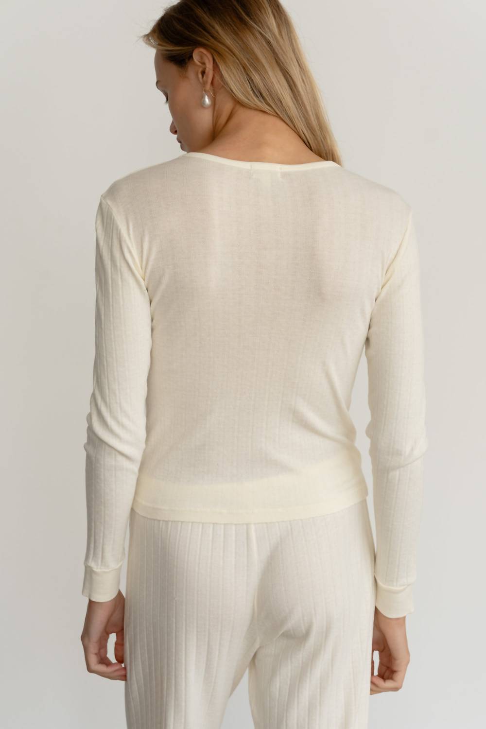 DONNI. Pointelle Long Sleeve Top in creme 1 - women's long sleeve top - detail view