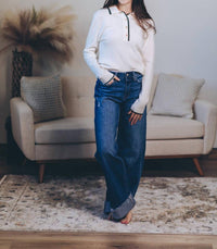 In February Quietly Elegant Sweater Polo in cream - women's long sleeve top - detail view