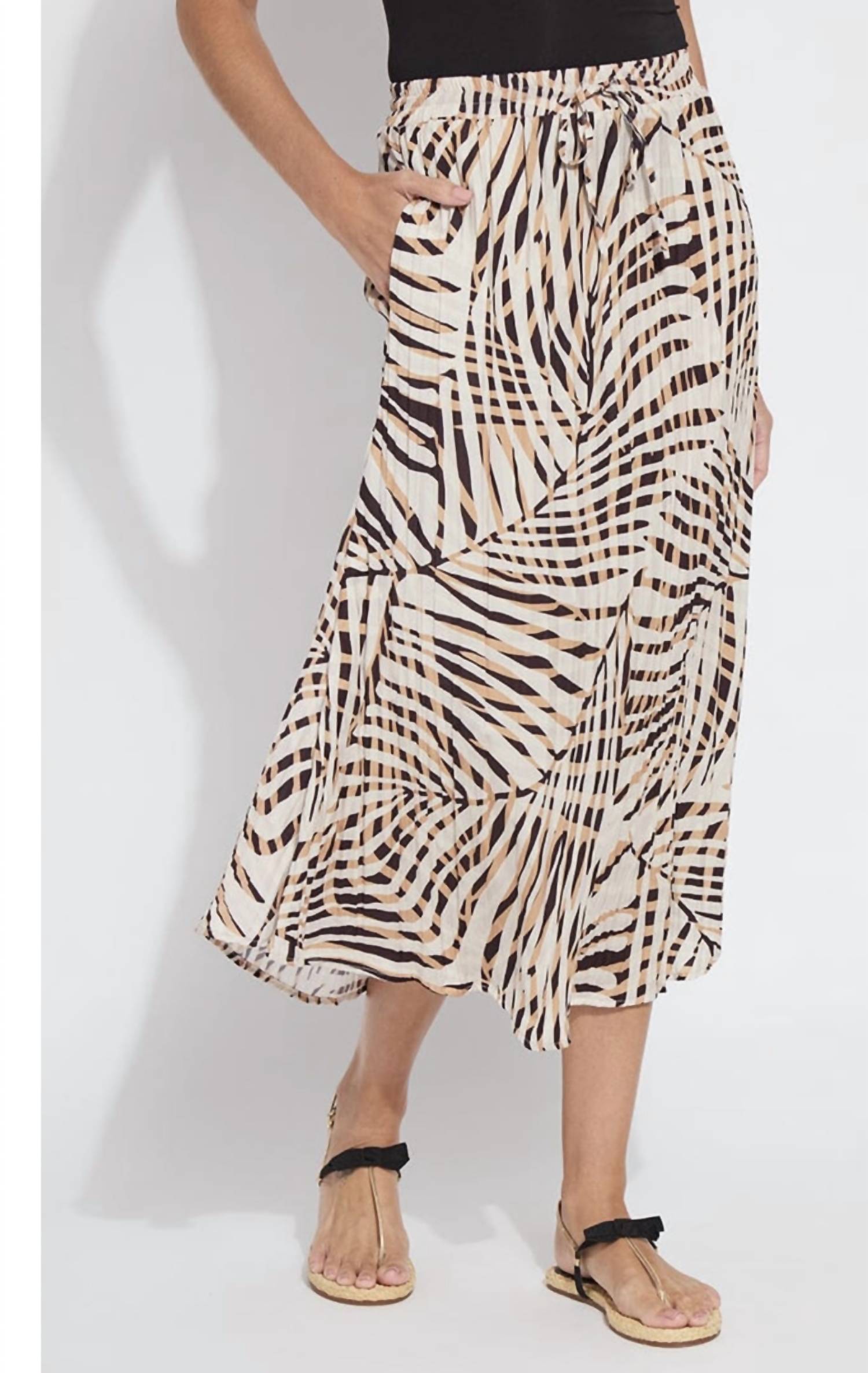 Lysse - the packable pleated skirt