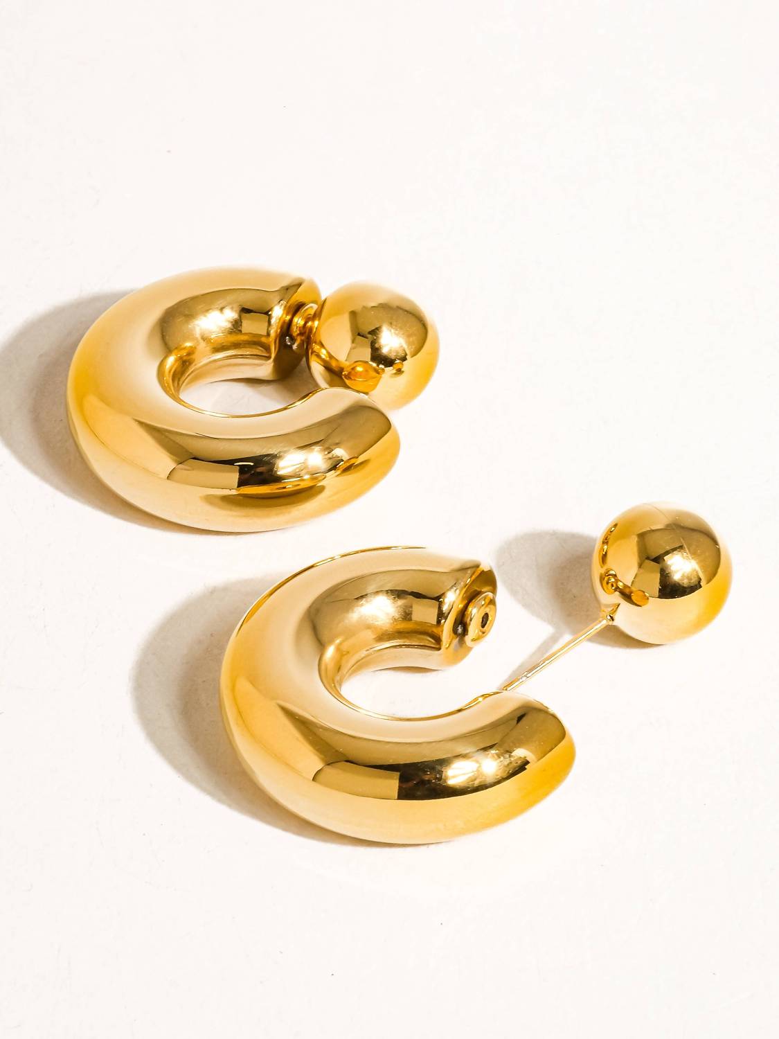 Flanerie by MAIQ Fernanda Non-tarnish Ball C Hoop Earring in yellow gold - women's jewelry - detail view
