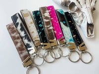 Boho Ranch Acid Wash Cowhide Hair-on Wristlet Keychain in turquoise - women's accessory - detail view