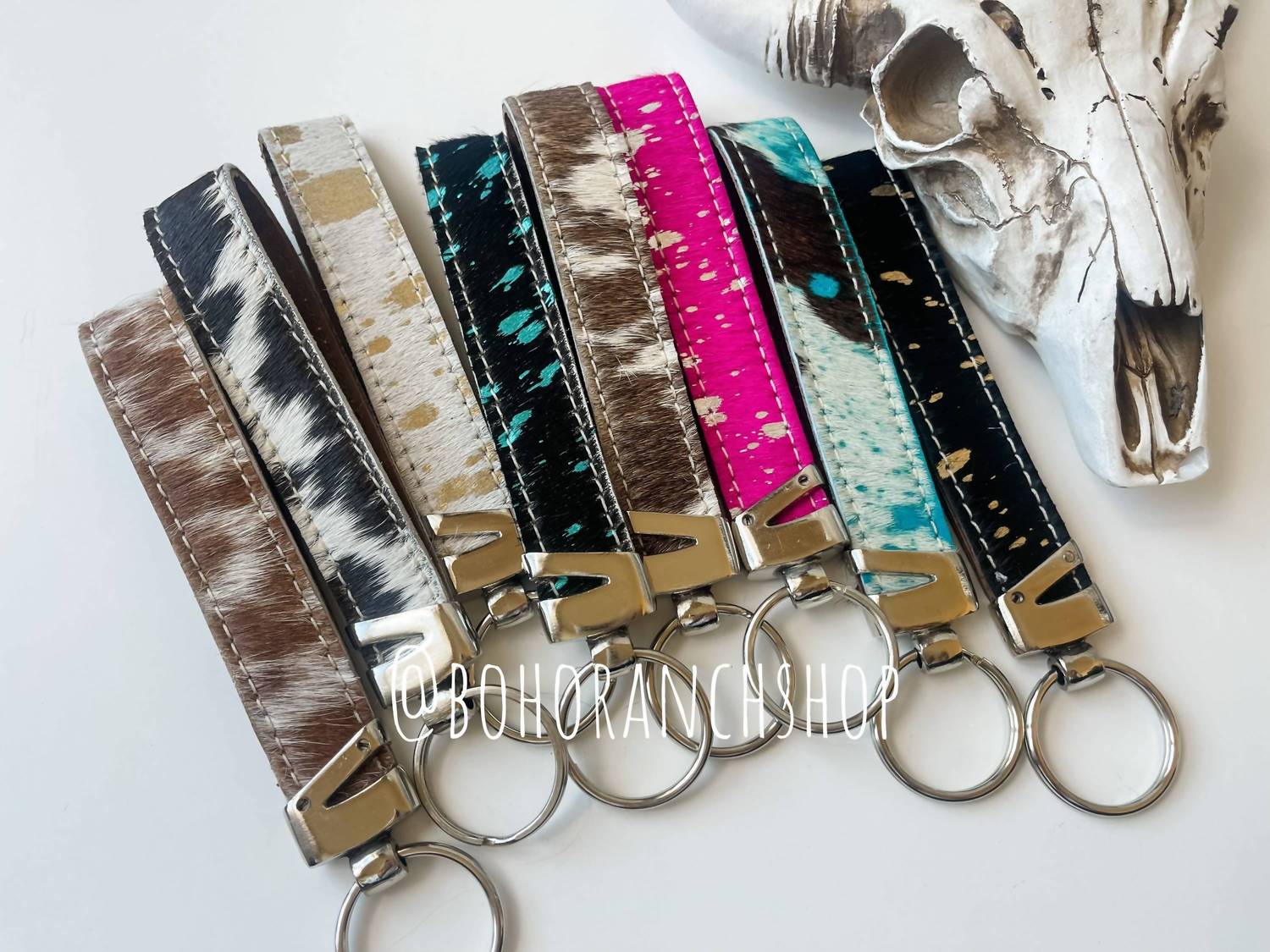 Boho Ranch Acid Wash Cowhide Hair-on Wristlet Keychain in turquoise - women's accessory - detail view