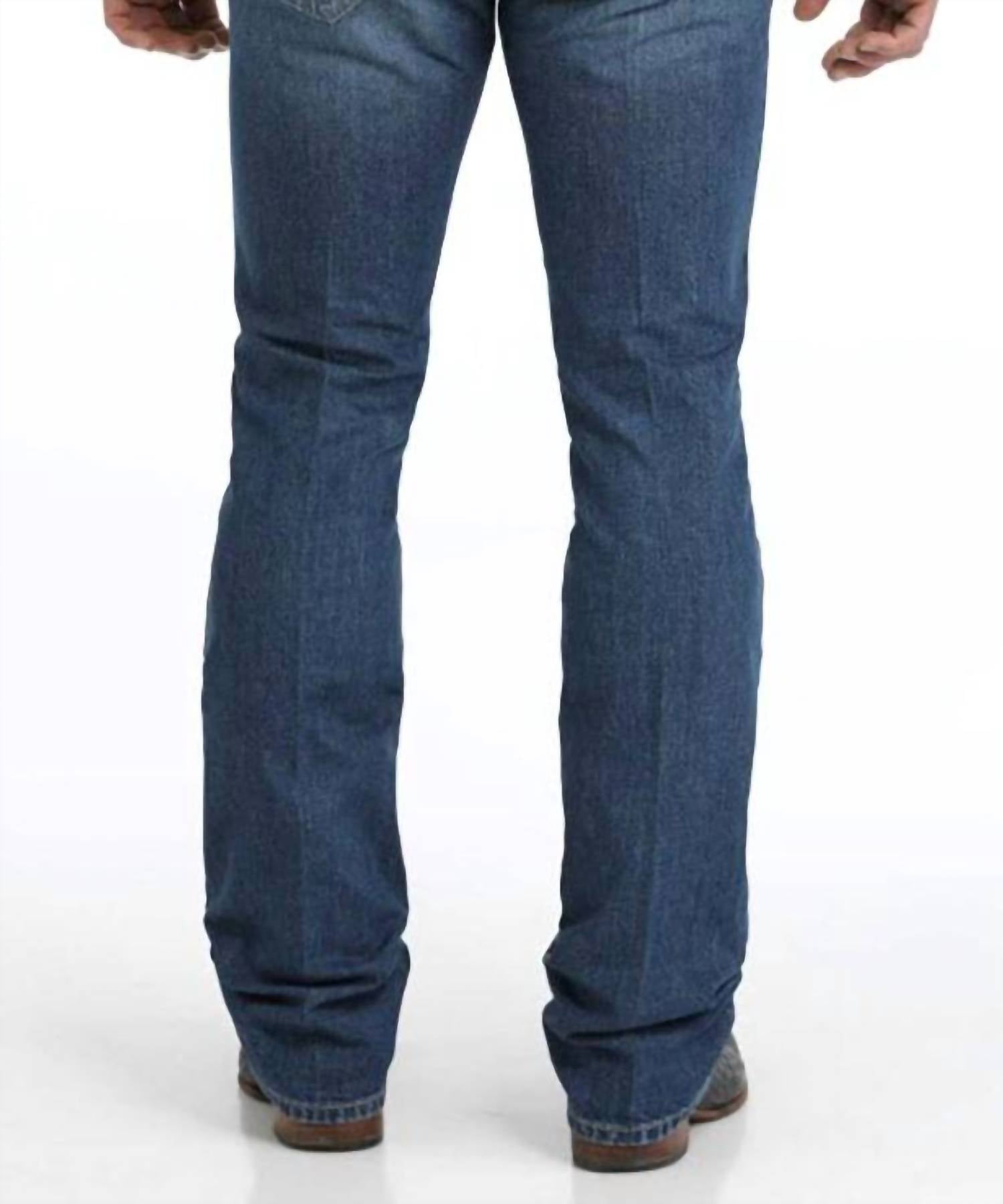 CINCH Men's Ian Slim Boot Cut Mid Rise Rigid Denim Jeans in medium stonewash - men's jeans - detail view