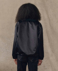 THE GREAT. Satin Coaches Jacket in black - women's jacket - detail view