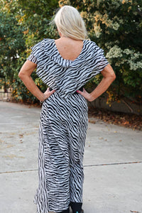 Sheer Ruffle Short Sleeve Zebra V Neck Top With Fitted Black Bodice