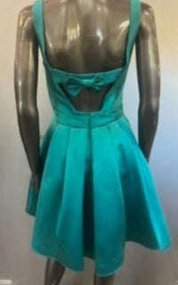 Madison James - Women's Flowy with bow detailing mini dress