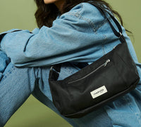 Rivedroite Paris Women's Charlot Micro Waxed Canvas Handbag in black - women's bag - detail view