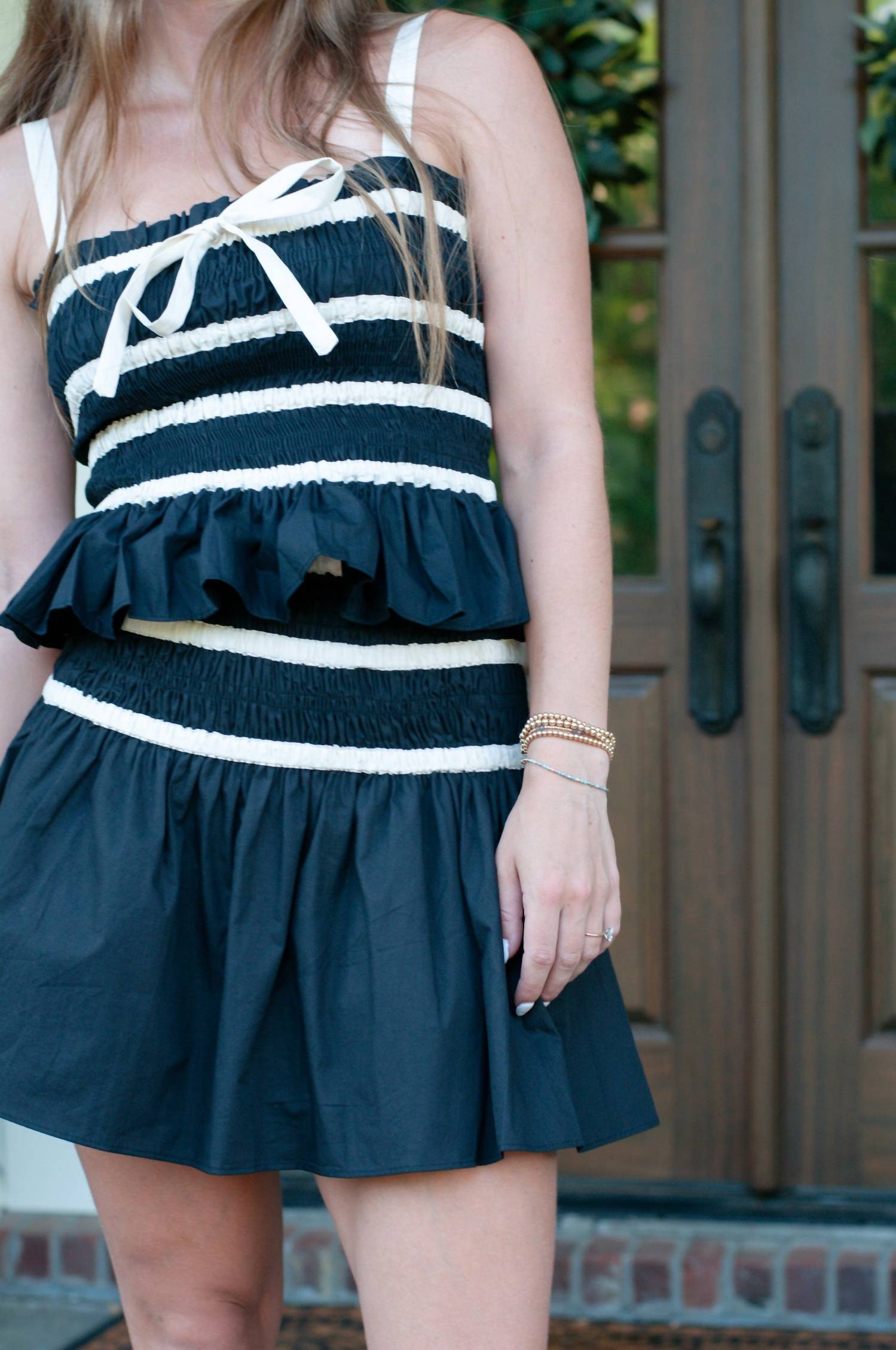 Aureum Hazel Smocked Mini Skirt Set in black - women's sleepwear - detail view
