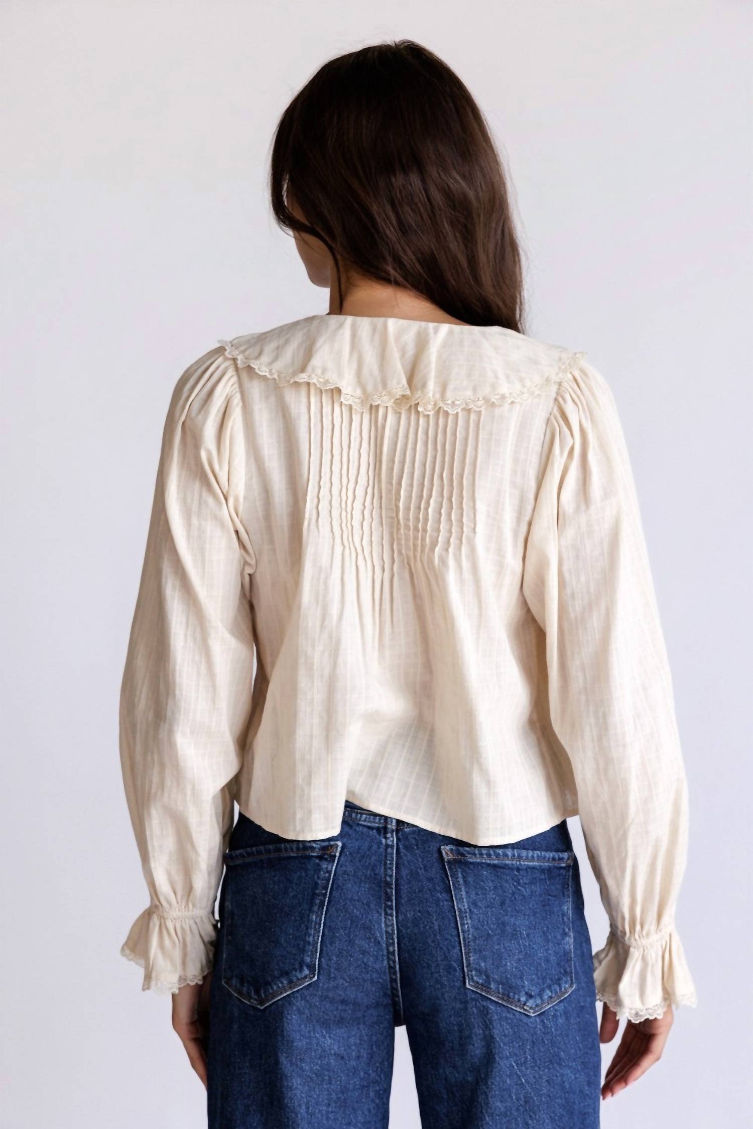 Storia - Adhara Ruffle V-neck Blouse