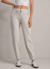 RHONE Dreamglow High-rise Waistband Jogger in sand - women's pants - detail view