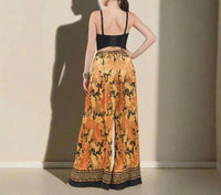 The Sang - Pleated Palazzo Pants
