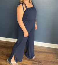 Tyche Tie Shoulder Jumpsuit in navy - women's pants - detail view