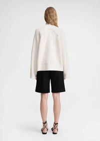 TOTEME Ribbed Chimney Neck Knit Top in white - women's sweater - detail view