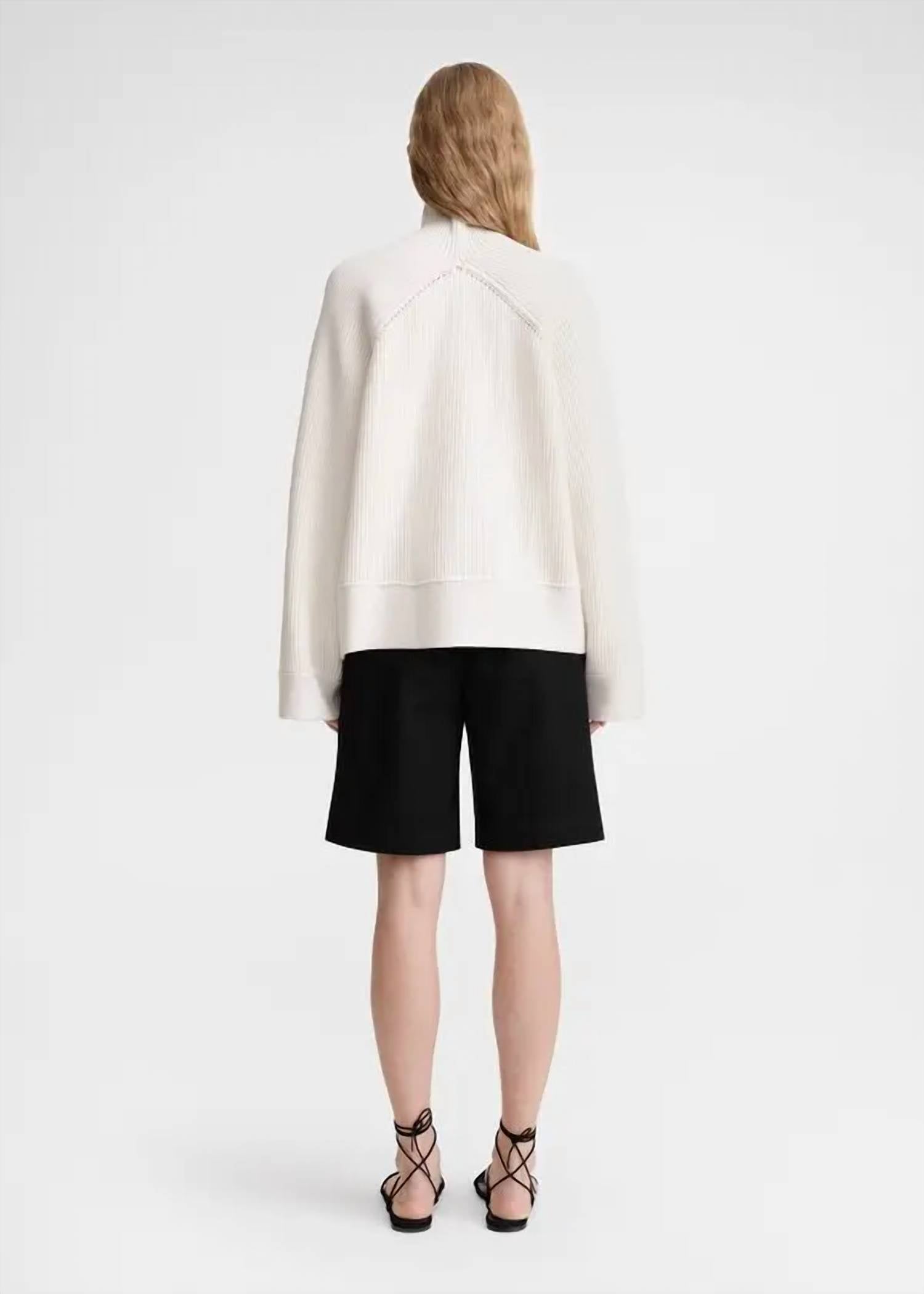 TOTEME Ribbed Chimney Neck Knit Top in white - women's sweater - detail view